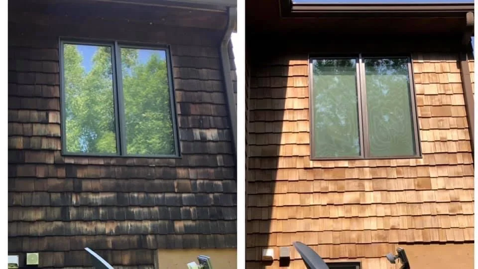 Before-and-after comparison of a house exterior showing dark, weathered wood shingles on the left and freshly cleaned, light brown shingles on the right, with a window centered in both images.
