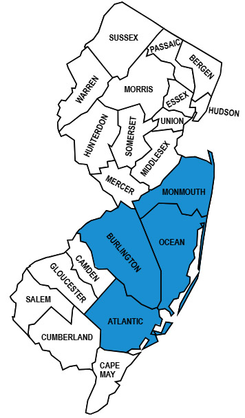 A flat, minimalist map of our New Jersey service area for pressure washing services showing all county borders. Atlantic County, Ocean County, Monmouth County, and Burlington County are highlighted